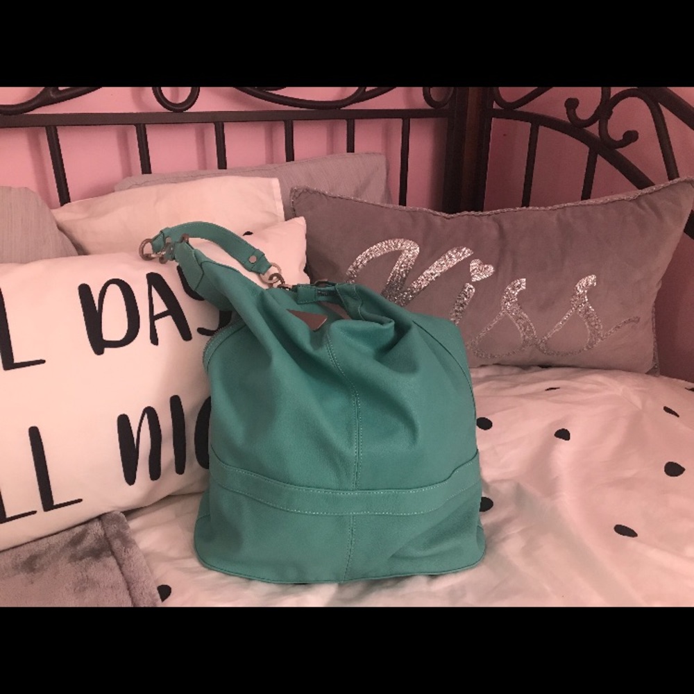 Kenneth Cole 
Beautiful authentic bag